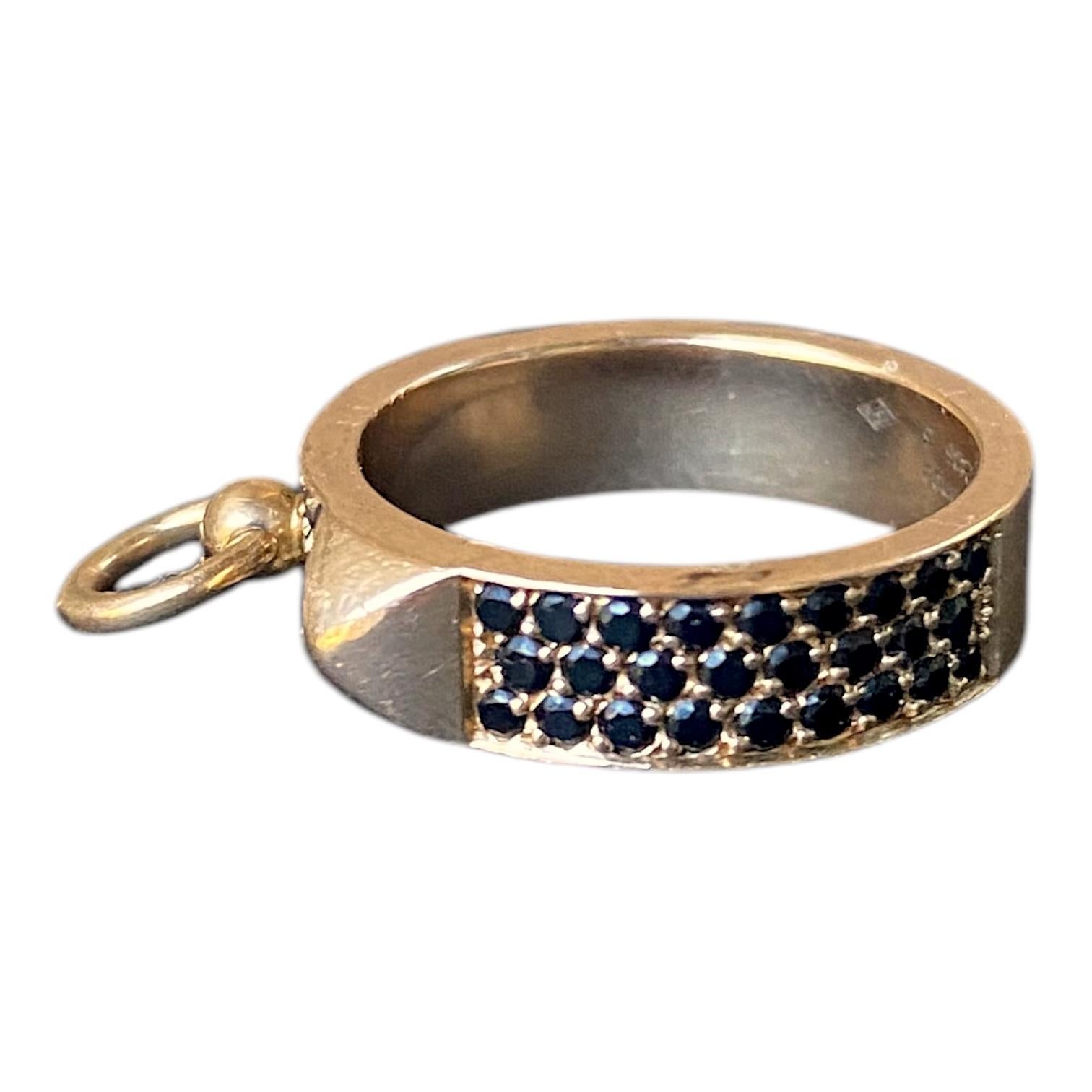 Hermés 18k rose gold ring from the iconic Collier de Chien collection.
The band features the signature studs embellished with black spinels.
Black Spinel: 0.69 ctw.
Weight: 6.8 g
Size: 5.75 US / 51 France
Marked: HERMÉS Made in France Au750 51