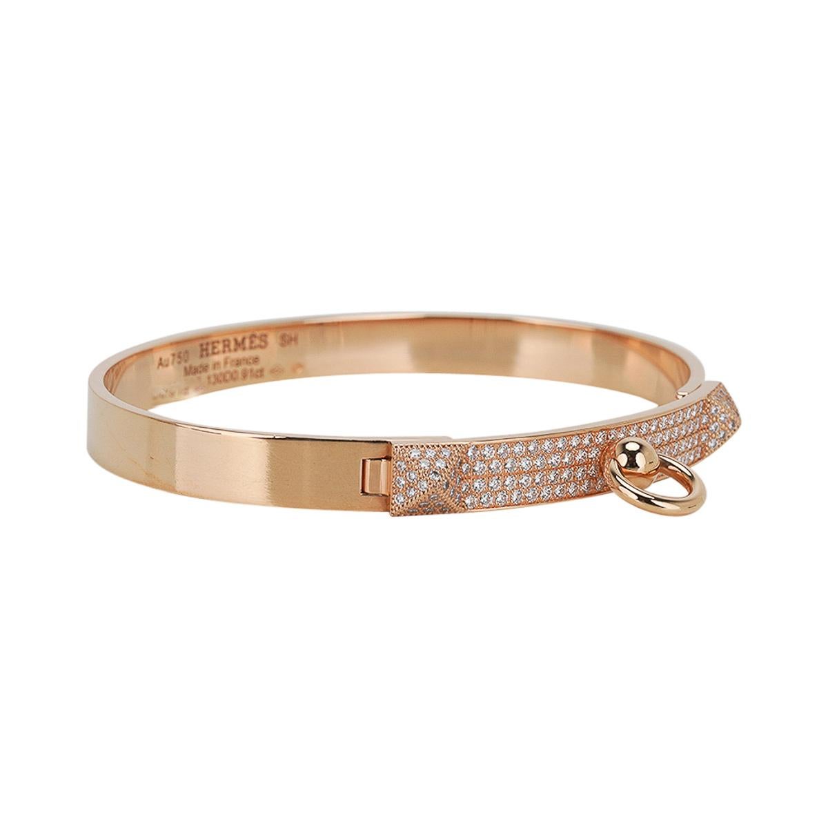 Mightychic offers an Hermes Diamond Collier de Chien bracelet featured in 18k Yellow Gold.
Set with 130 Diamonds.
Total carat weight is 0.91 ct.
Chic and instantly recognizable.
Bracelet has signature stamps inside.
Comes with signature brown pouch