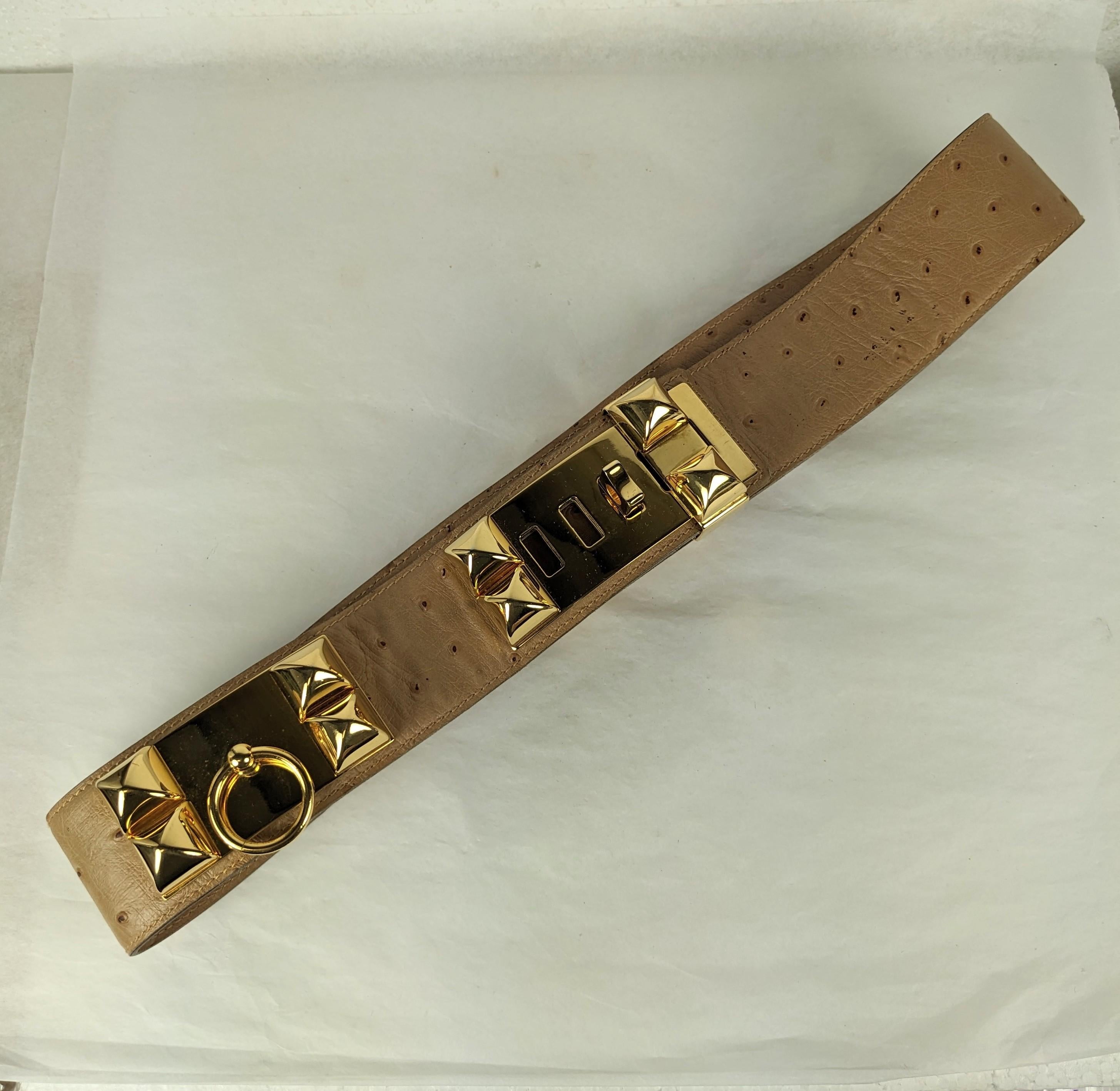 Authentic, elegant Hermes Collier de Chien Ostrich Belt from the 1980's. Exotic ostrich skin with polished gold palladium belt buckle accented by studs.
Total Length 35
