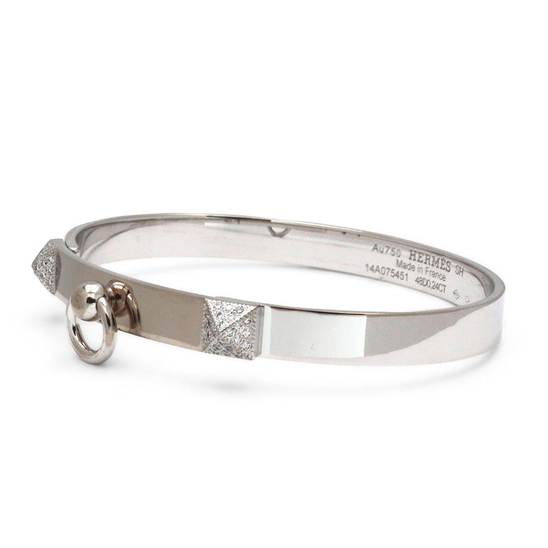 Authentic Hermès 'Collier de Chien' bracelet crafted in 18k white gold. Set with round brilliant cut diamonds on each end with a total carat weight of 0.24. Will fit up to a 5 1/2 inch wrist. Signed Hermes, AU750, SH, Made in France, with serial