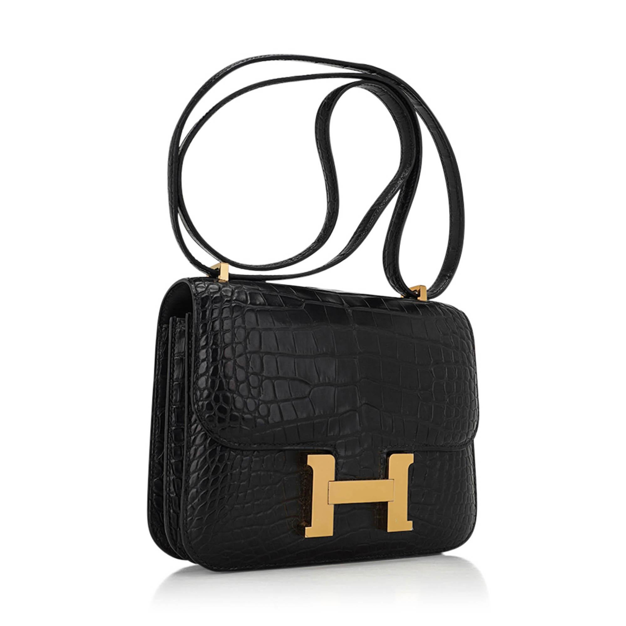 Mightychic offers an Hermes 18 Constance bag featured in Black Matte Alligator.
Removeable mirror with alligator tab. 
Rich with Gold hardware.
The effect is understated chic.
Hermes Paris Made in France is stamped on front under flap.
Comes with