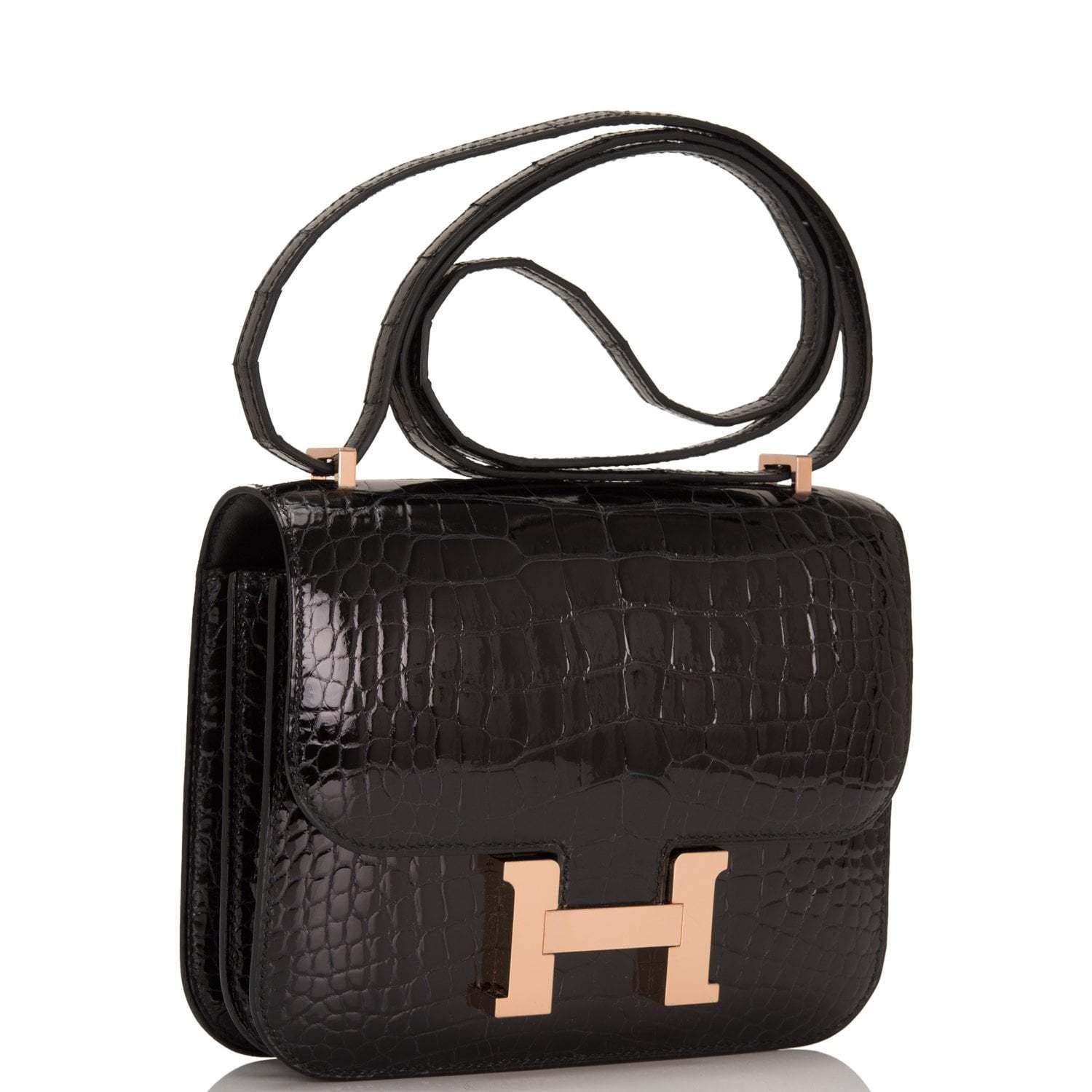 Hermes Alligator Constance
Black 
18/19 Cm 
Shiny 
Rare find!
Absolutely a must have for the avid collector
Rose Gold Hardware, this is the new finish that Hermes has introduced and it gorgeous!
Brand new never used
Collection C
Hermes Box, Cites,