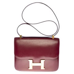 Hermes Constance 23 shoulder bag in burgundy calfskin with gold hardware !