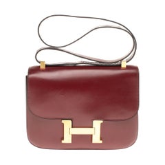 Hermes Constance 23 shoulder bag in burgundy calfskin with gold hardware !