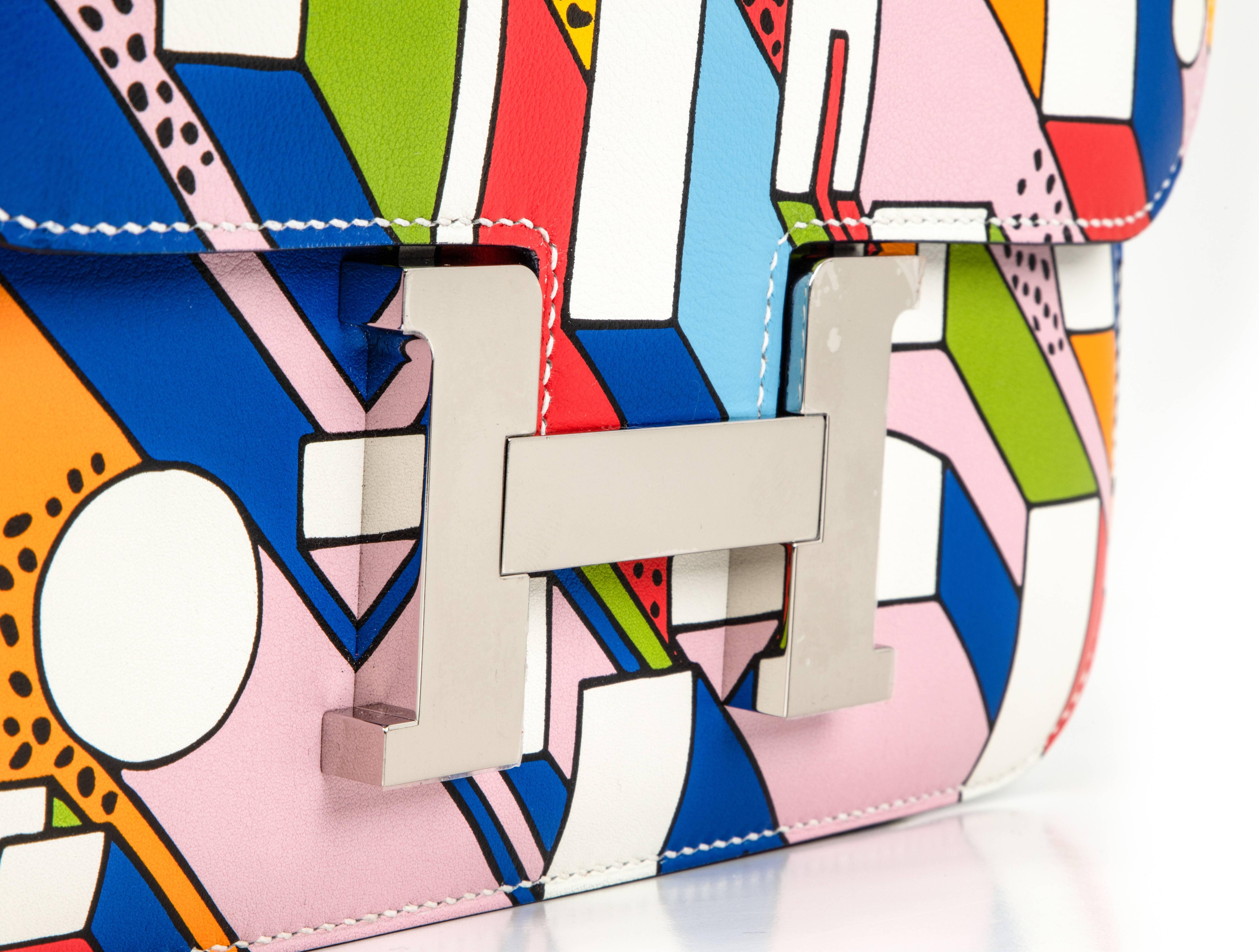Guaranteed authentic Limited Edition Hermes 24 Constance On a Summer's Day collaborated with artist Nigel Peake is a vivid abstract in soft pinks, warm yellow, orange, black, red, blues and white.
A beautiful and striking creation for the summer and