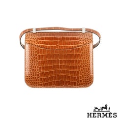 Hermés Constance 24cm Cuivre Lisse Alligator PHW