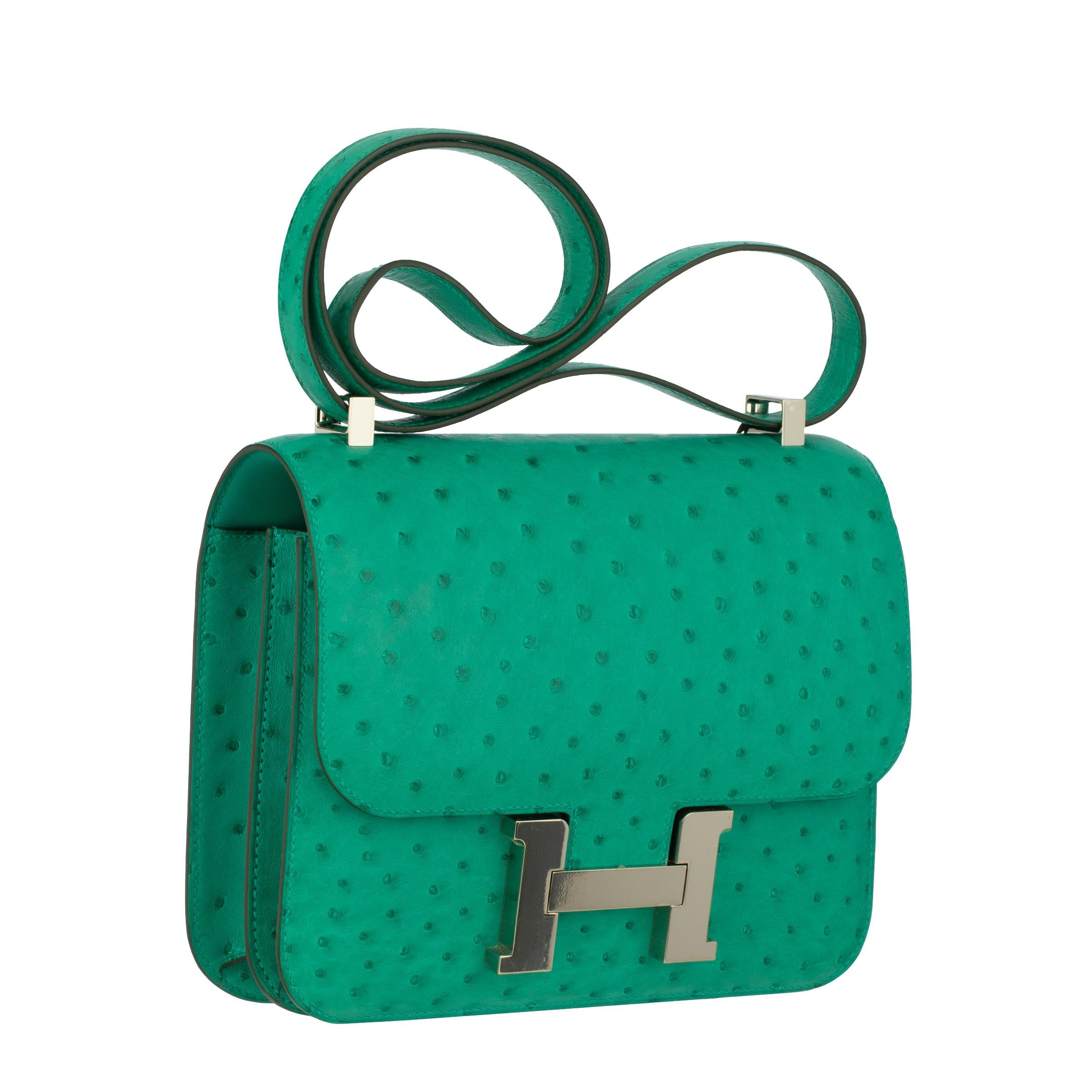 Brand: Hermes

Product: Constance 24

Size:
CM: 24 l x 15 h x 5 d
INCH: 9.5 l x 7 h x 2 d

Strap: Versatile design allows it to be worn as a single or doubled strap.

Colour: Vert Vertigo

Material: Ostrich

Hardware: Palladium

Year: D