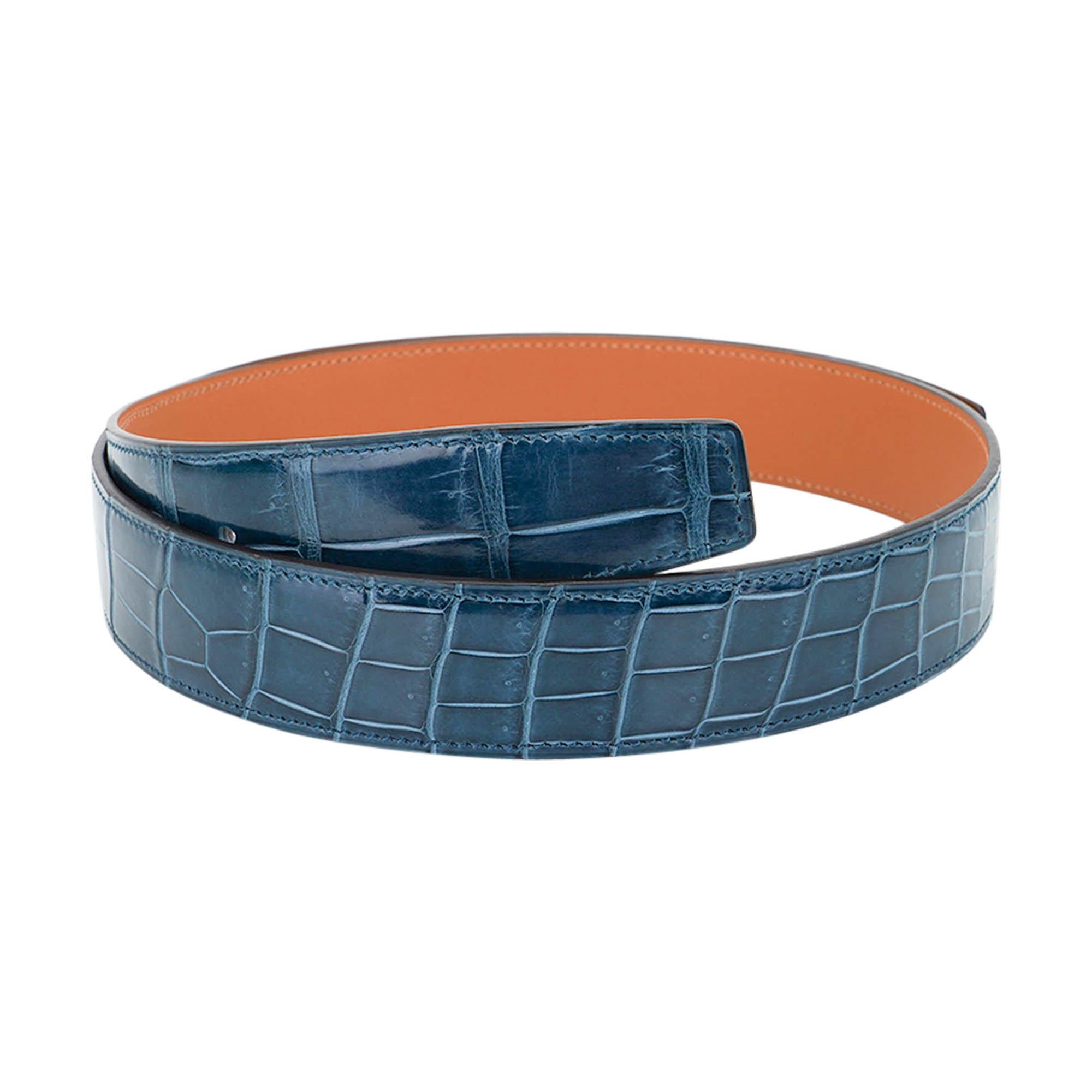 Mightychic offers an Hermes Constance 32 mm belt strap ONLY featured in Bleu Colvert
Porosus Crocodile.
This gorgeous neutral muted blue creates a very chic and wearable belt.
Pairs beautifully with either a Palladium or Gold 32 mm buckle.
Signature
