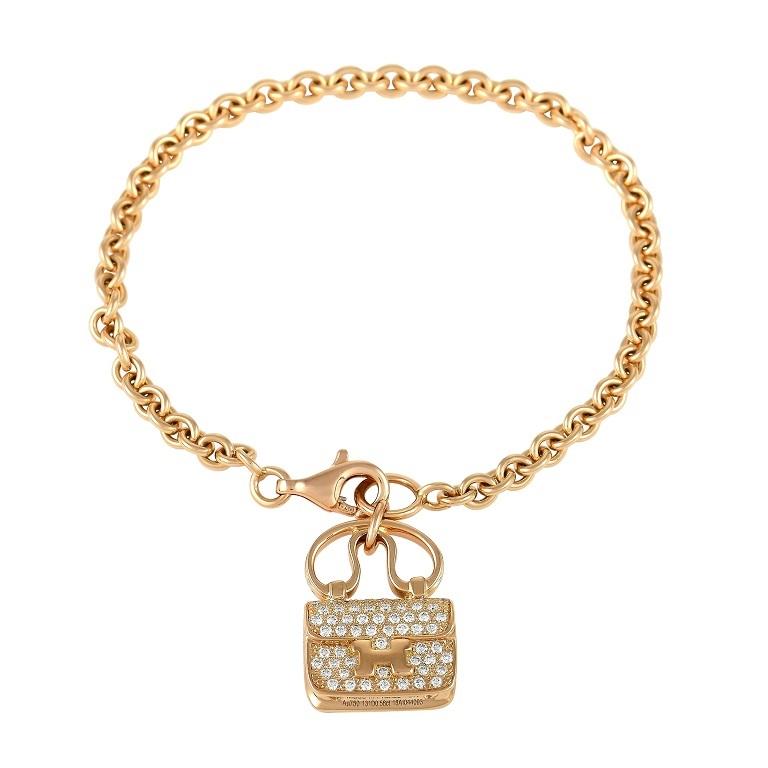 Hermès Constance Amulette Armband, 18 Karat Gelbgold 0,56 Karat Diamant im Zustand „Hervorragend“ in Southampton, PA