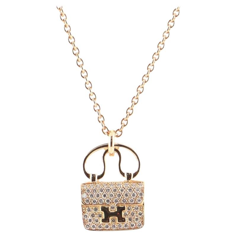 Sold at Auction: Hermes - New - Diamond Charm Bracelet - 18K Rose Gold H  Logo Pendant