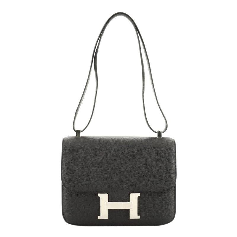 hermès constance 24 shiny noir porosus with white gold & diamond hardware