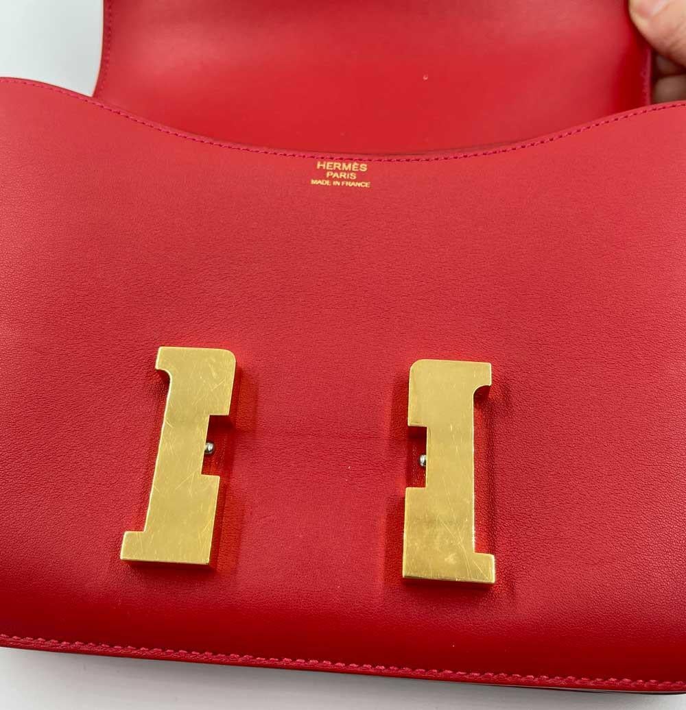 Brown HERMES Constance Bag in Rouge Casaque Swift Leather