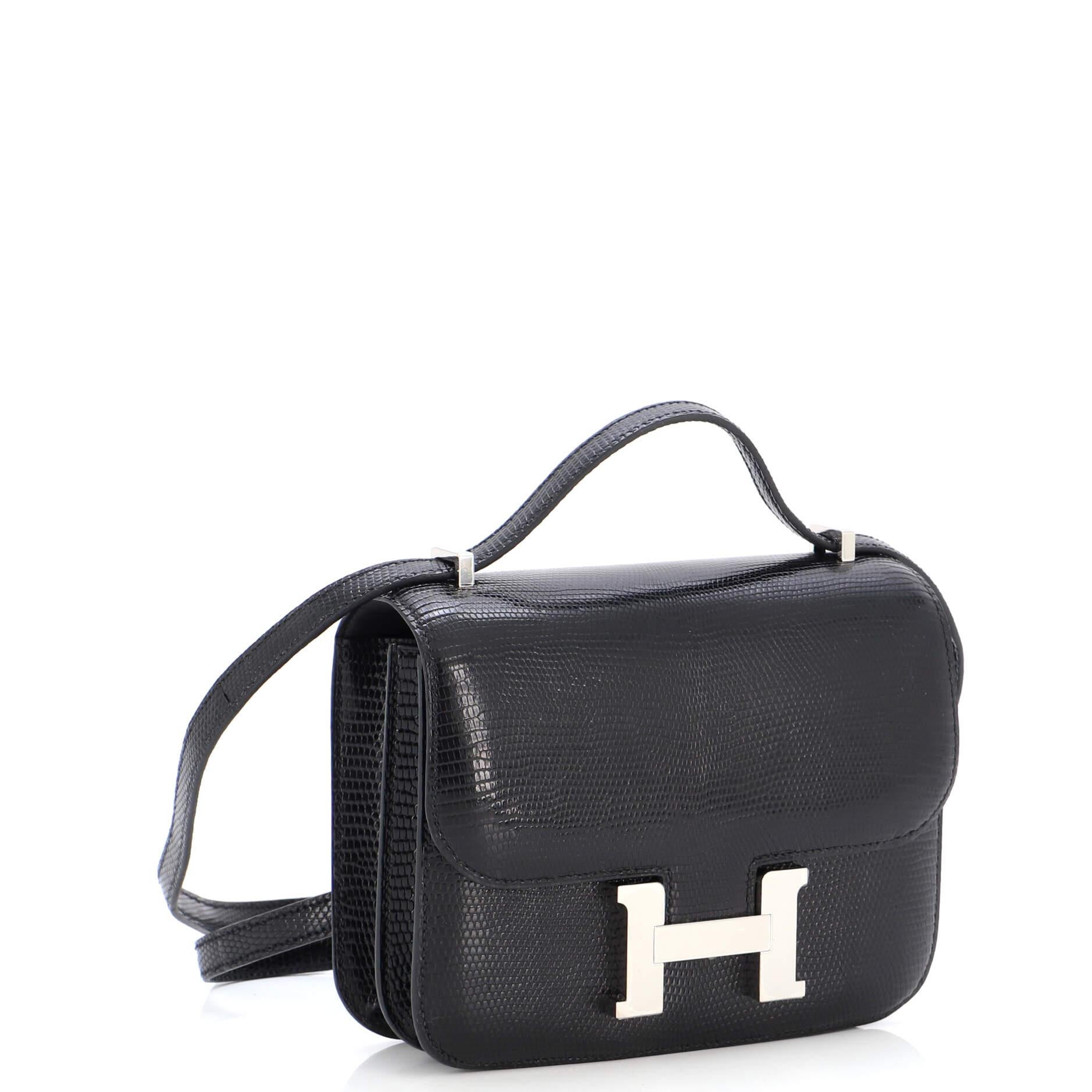 This item can only be shipped within the United States.

Condition: Very good. Creasing, scuffs, small marks and moderate wear on exterior and strap, Scuffs and indentations underneath flap and in interior, scratches on hardware.
Accessories: