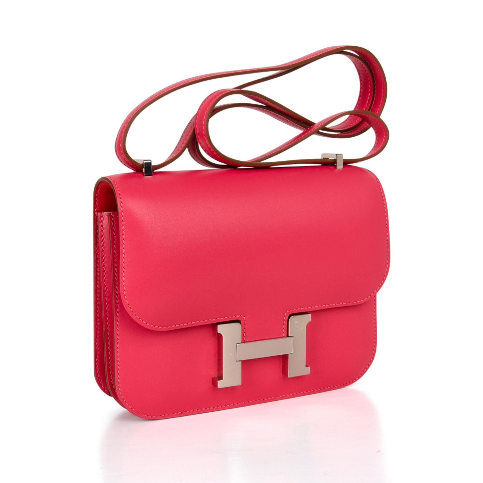 Mightychic offers an Hermes Constance 18 bag featured in Rose Lipstick.
This chic Hermes Mini III pink Constance bag is exquisite in utterly smooth Veau Tadelakt leather.
Fresh with palladium hardware.
HERMES PARIS MADE IN FRANCE is stamped on front