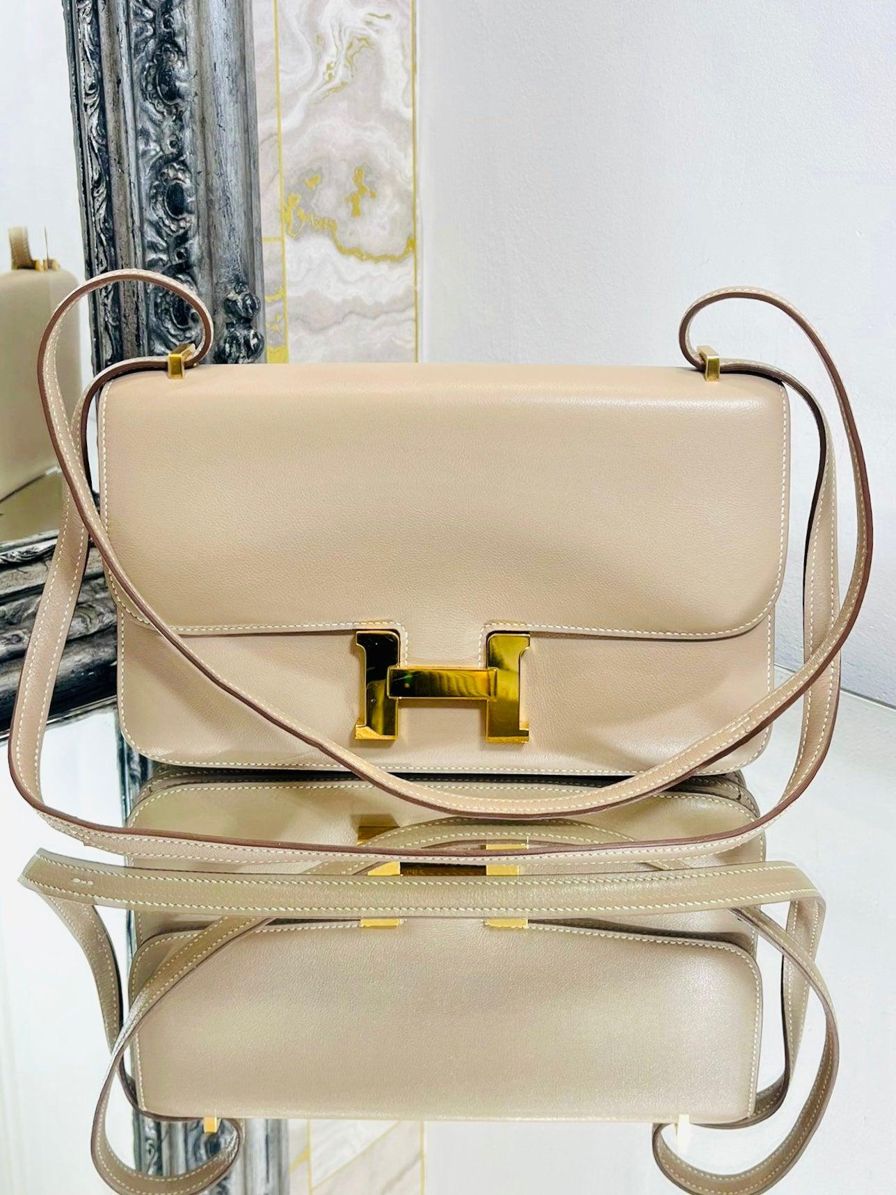 Hermes Constance Elan Crossbody Bag

Taupe leather with gold hardware. Crossbody strap.

Date code 2012.

Size - Height 16cm, Width 29cm, Depth 5cm

Condition - Very Good (Some light scratches to hardware)

Composition - Leather

Comes With - Box,