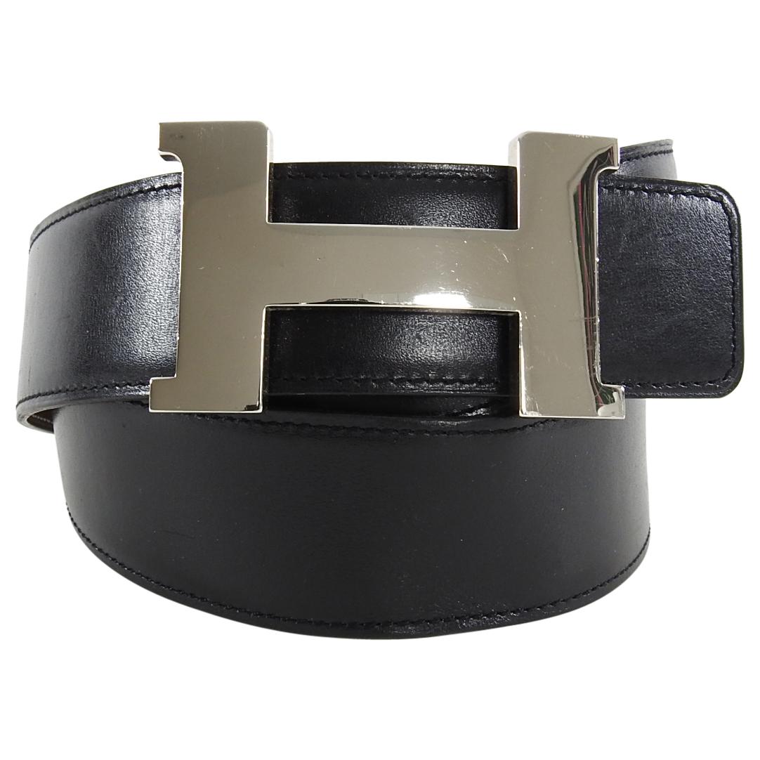 Hermes Constance H Belt. This is originally a men's belt but can be worn unisex.  Largest H Constance buckle belt with shiny silvertone metal and reversible black and brown leather belt.  Belt measures 42mm wide and buckle is 3.25 x 2