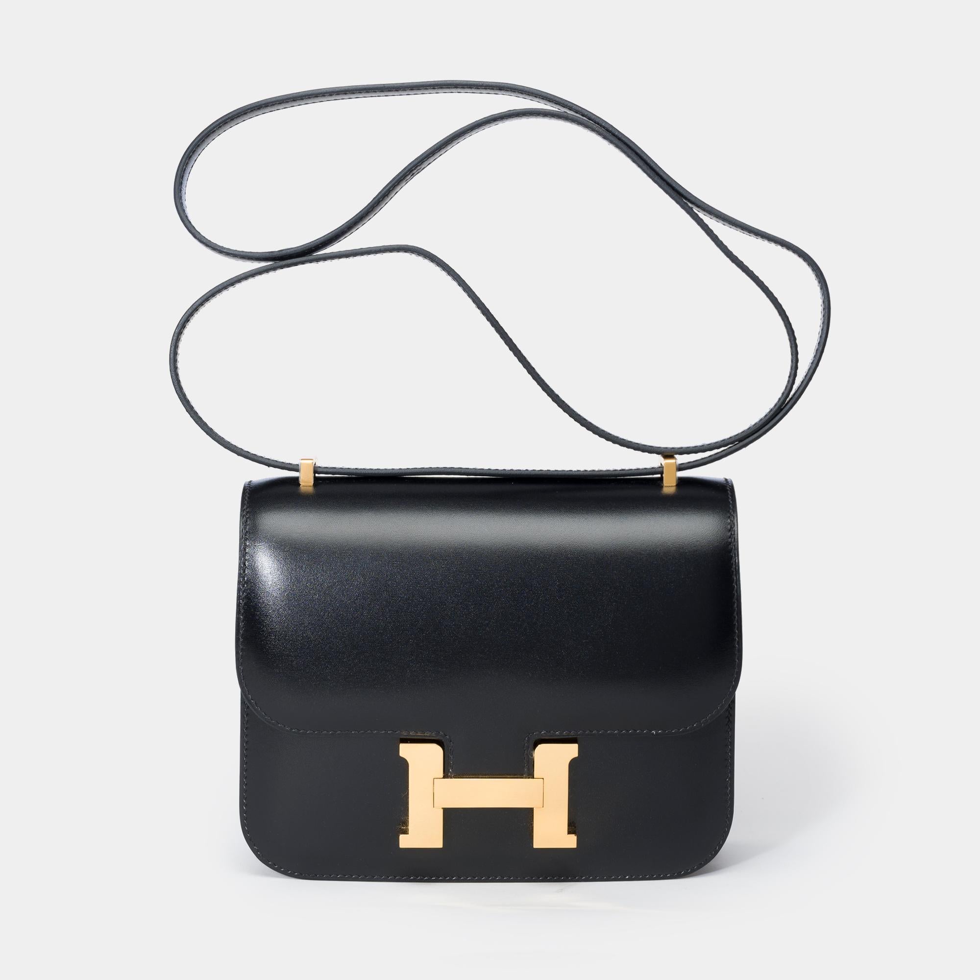 Stunning and Rare Hermès Constance III Mini 18 Mirror shoulder bag in black box calf leather, gold plated metal trim ,a black box leather shoulder strap for shoulder or crossbody carry

Logo closure on flap
Black leather lining, two compartments,