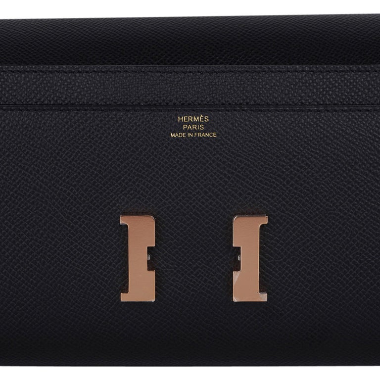 Mightychic offers a guaranteed authentic coveted Hermes Constance Long To Go wallet featured in classic Black.
Rich with coveted Rose Gold hardware, and sleek in Epsom leather.
The consummate 'Wallet on a Chain'.
Remove the detachable strap to carry