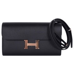 Hermès - Portefeuille « Constance Long To Go » en cuir Epsom noir et or rose, neuf avec boîte