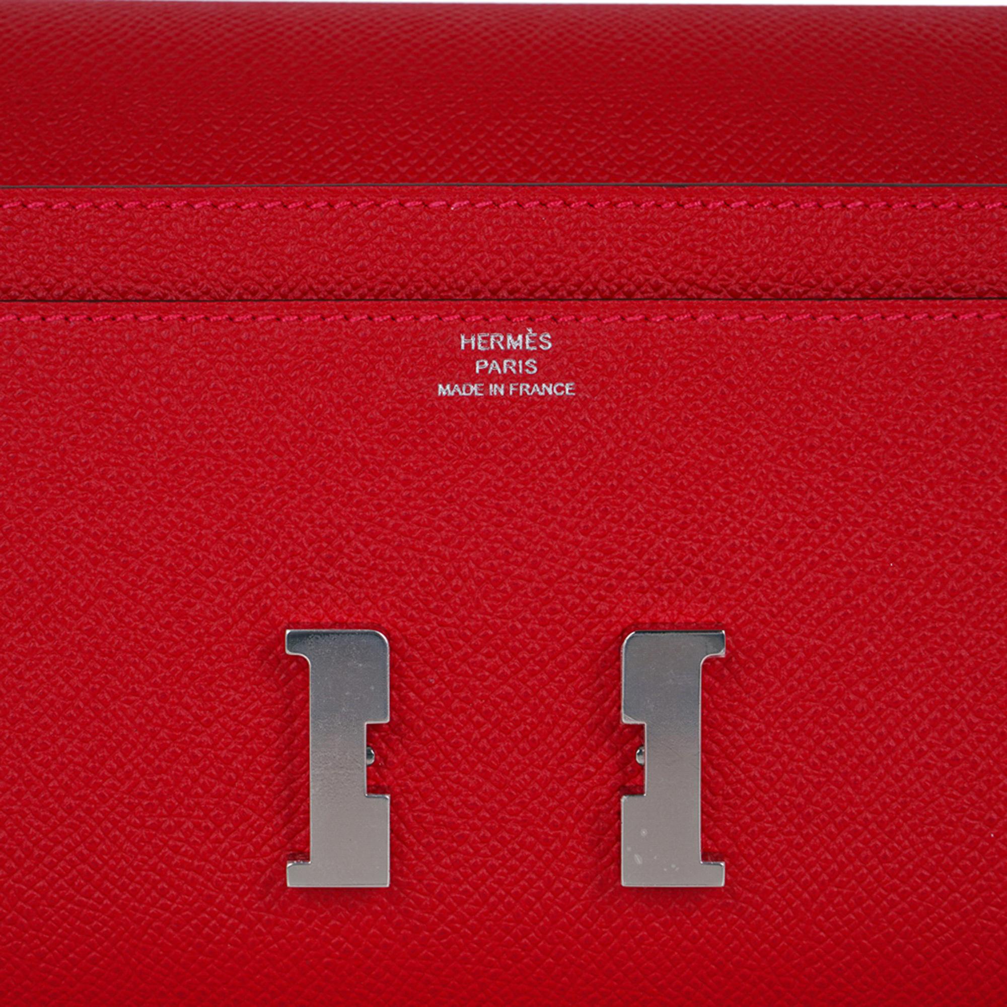 mightychic offer a guaranteed authentic coveted Hermes Constance Long To Go Wallet featured in Rouge Casaque.
Accentuated with Palladium hardware.
Detachable crossbody / shoulder strap converts this gorgeous Constance To Go Wallet  to a clutch.
The