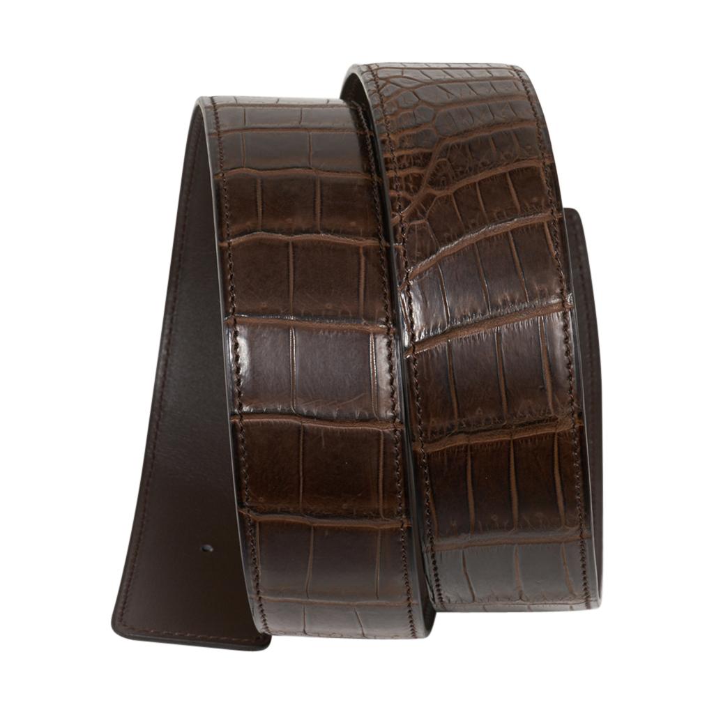 Mightychic offers an Hermes Constance 42 mm belt featured in Matte Havane Porosus Crocodile reversible to Brown leather.  
Fabulous over sized brushed gold signature H buckle.  
Now a retired size, and very difficult to procure, this is sure to