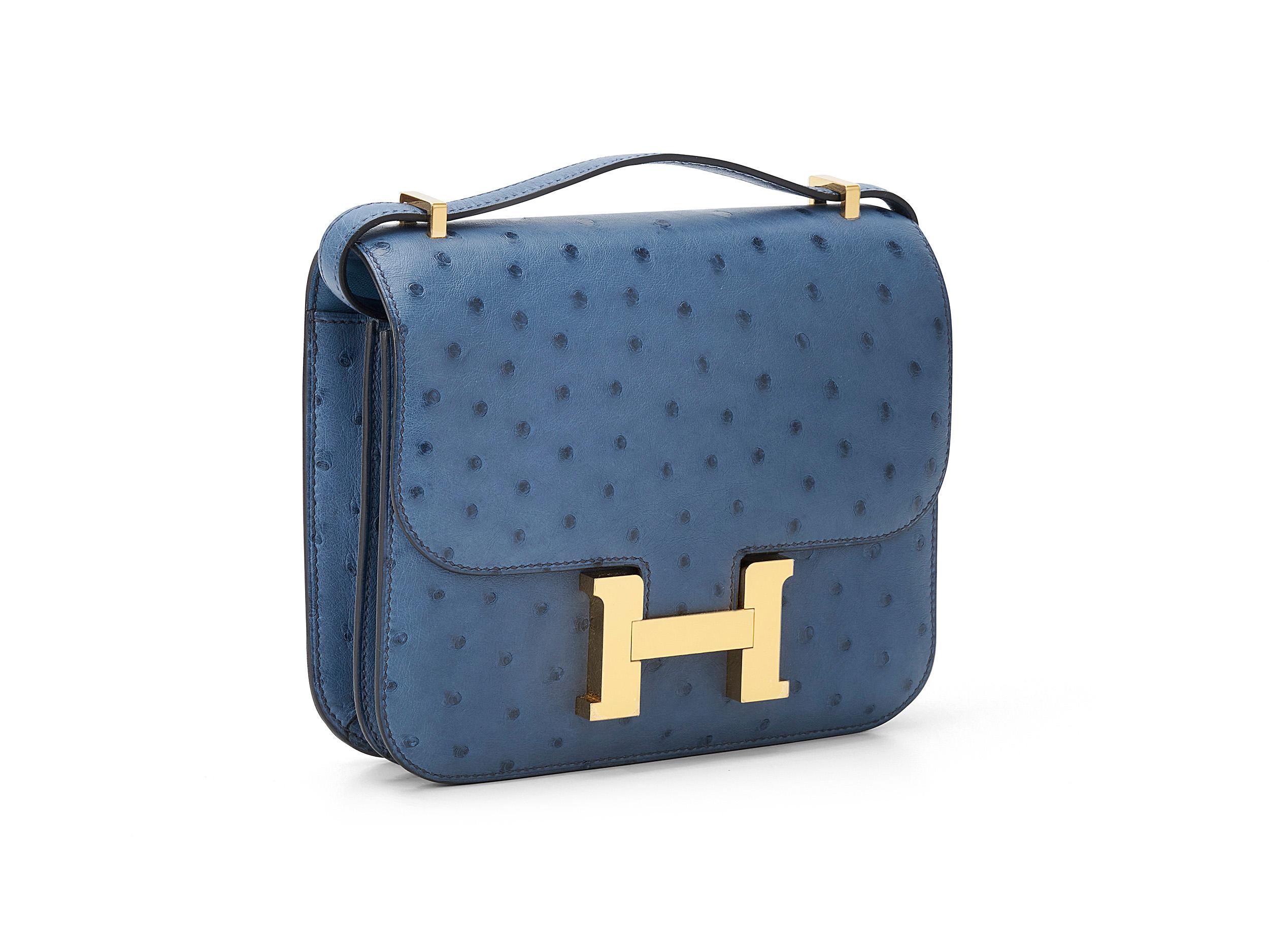 Hermès Constance Mini 18 in bleu roy and ostrich leather with gold hardware. The bag is unworn and comes as full set with the original receipt.
Stamp Y (2020) 

