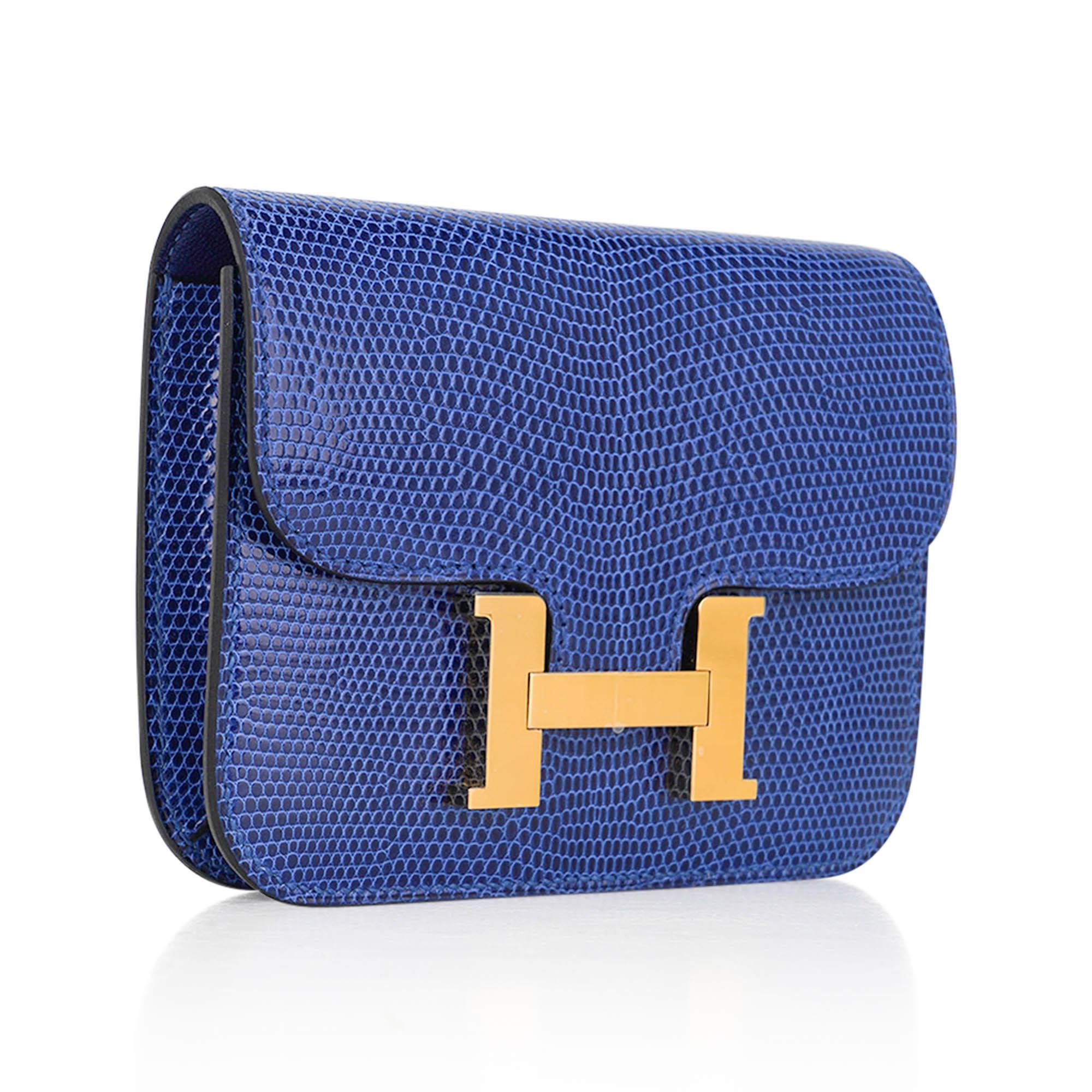 Mightychic offers an Hermes Constance Slim Wallet Belt bag featured in Bleu Sapphire Lizard.
Richly saturated, this exquisite versatile wallet is a rare find.
Includes removable zipped change purse and 2 credit card slots
Beautiful with Gold