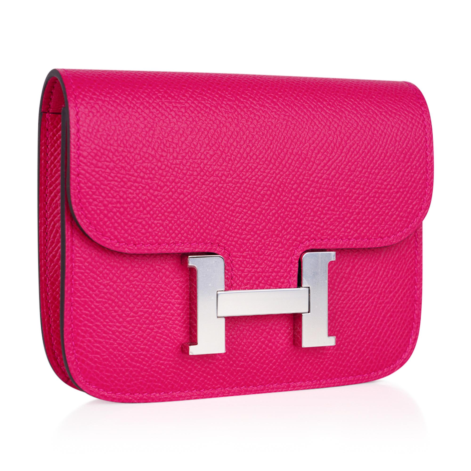 Guaranteed authentic Hermes Constance Slim Wallet Belt bag featured in vibrant Rose Mexico.
Includes removable zipped change purse and 2 credit card slots.
Rear belt loop.
Epsom leather.
Fresh with Palladium hardware.
Comes with sleeper and
