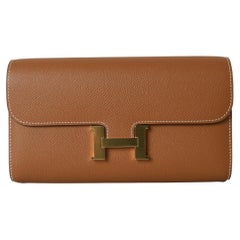 Constance To Go Brieftasche Gold von Hermès