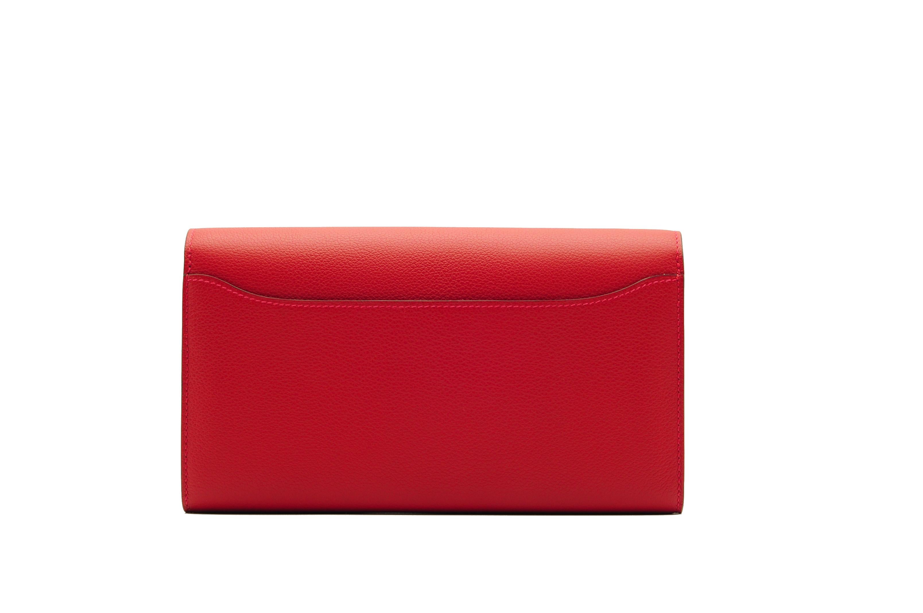 
Brand: Hermès 
Style: Constance Wallet
Size: Long
Color: Rouge Casaque
Leather: Evercolor
Hardware: Gold
Stamp: 2018 C

Condition: Pristine, never carried: The item has never been carried and is in pristine condition complete with all