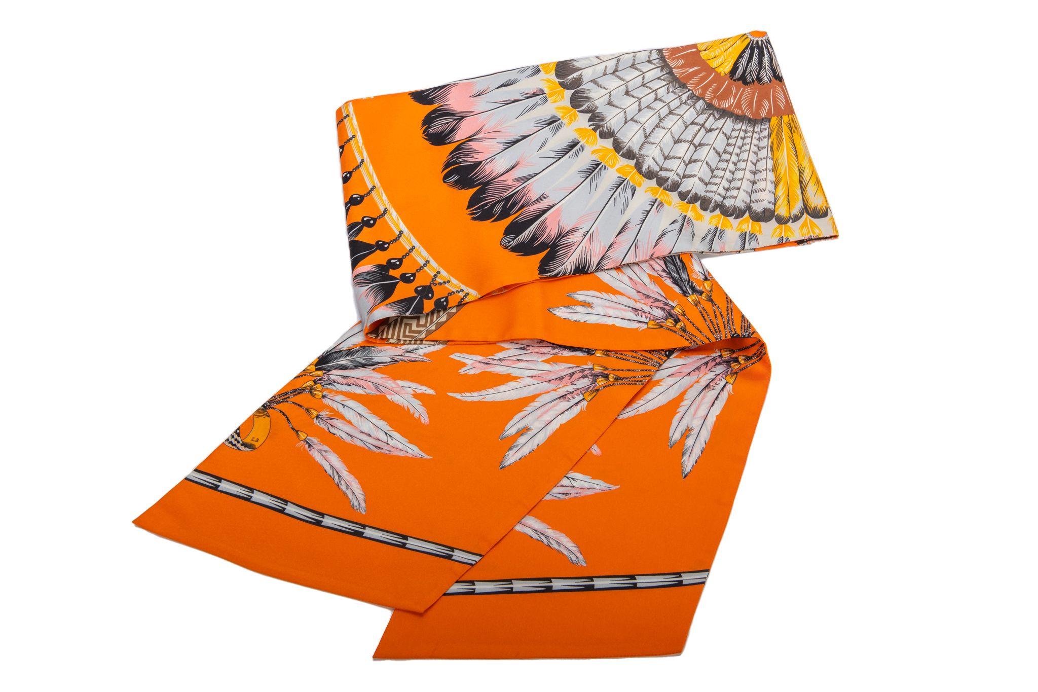 Hermès Brazil maxi twilly scarf with feather floral detail. Hand-rolled edges. Discontinued size. New in box.
