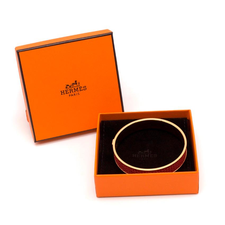 Hermes Coral Kawaii 07 Lizard Bangle

-Coral lizard bangle
-Circa: 1998
-Gold plated
-'H' embossed plate
-Brand new condition with dustbag and box

Please note, these items are pre-owned and may show signs of being stored even when unworn and