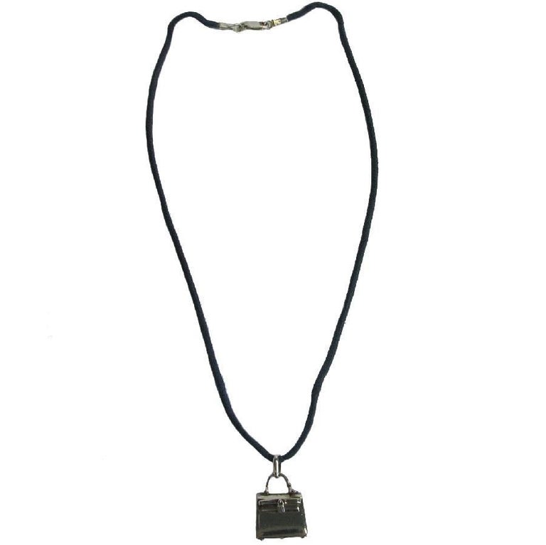 HERMES Cord necklace and 'Kelly Bag' Amulet Pendant in Sterling Silver