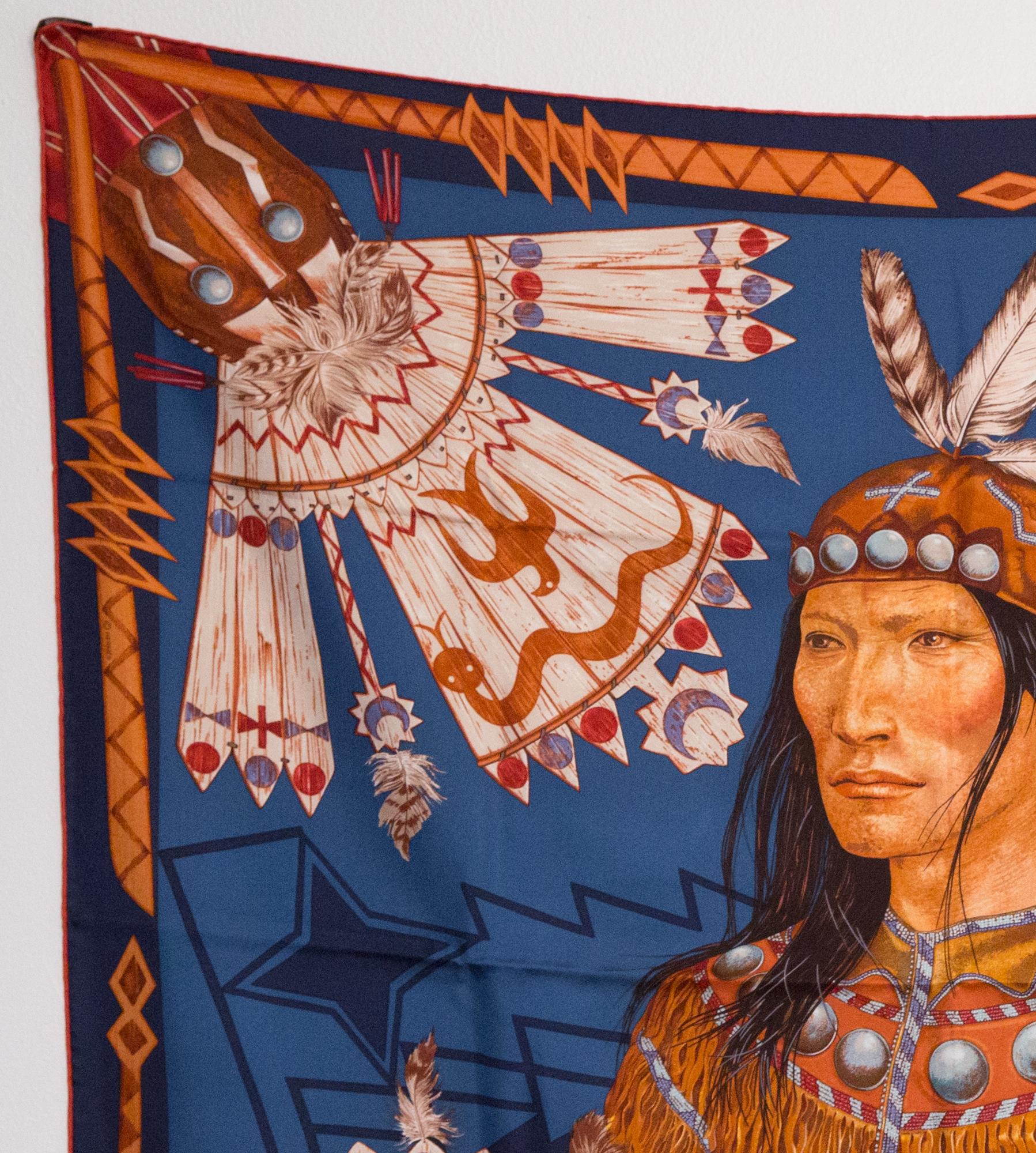 Hermes silk scarf  Cosmogonie Apache by A Tzapoff featuring a blue and brown Apache scene.
The Cosmogonie Apache was created in 2011.
In excellent vintage condition. Made in France. Delivered in box.
35,4in. (90cm)  X 35,4in. (90cm)
We guarantee you