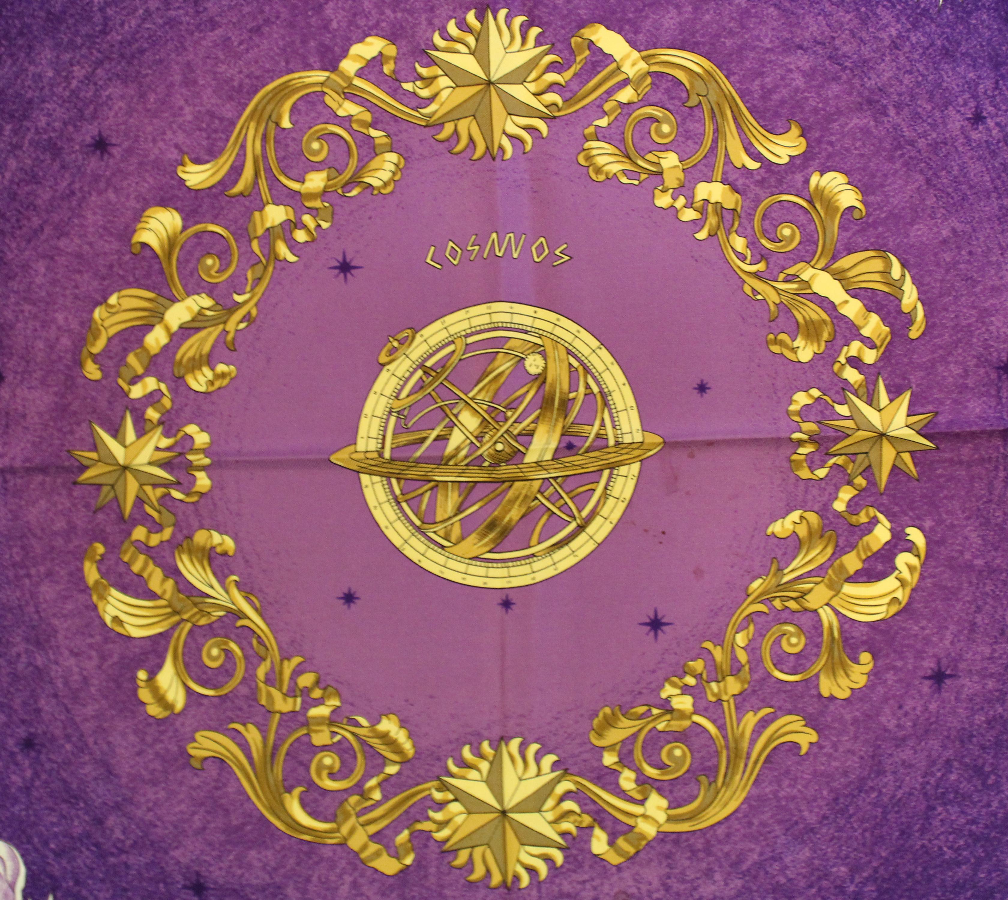 This Hermes scarf was created by none other than Philippe Ledoux, who has been a favorite designer of the House of Hermes.  This Cosmos scarf in vibrant purple tones is beautifully designed.  Philippe Ledoux, it can be argued, has left a huge impact