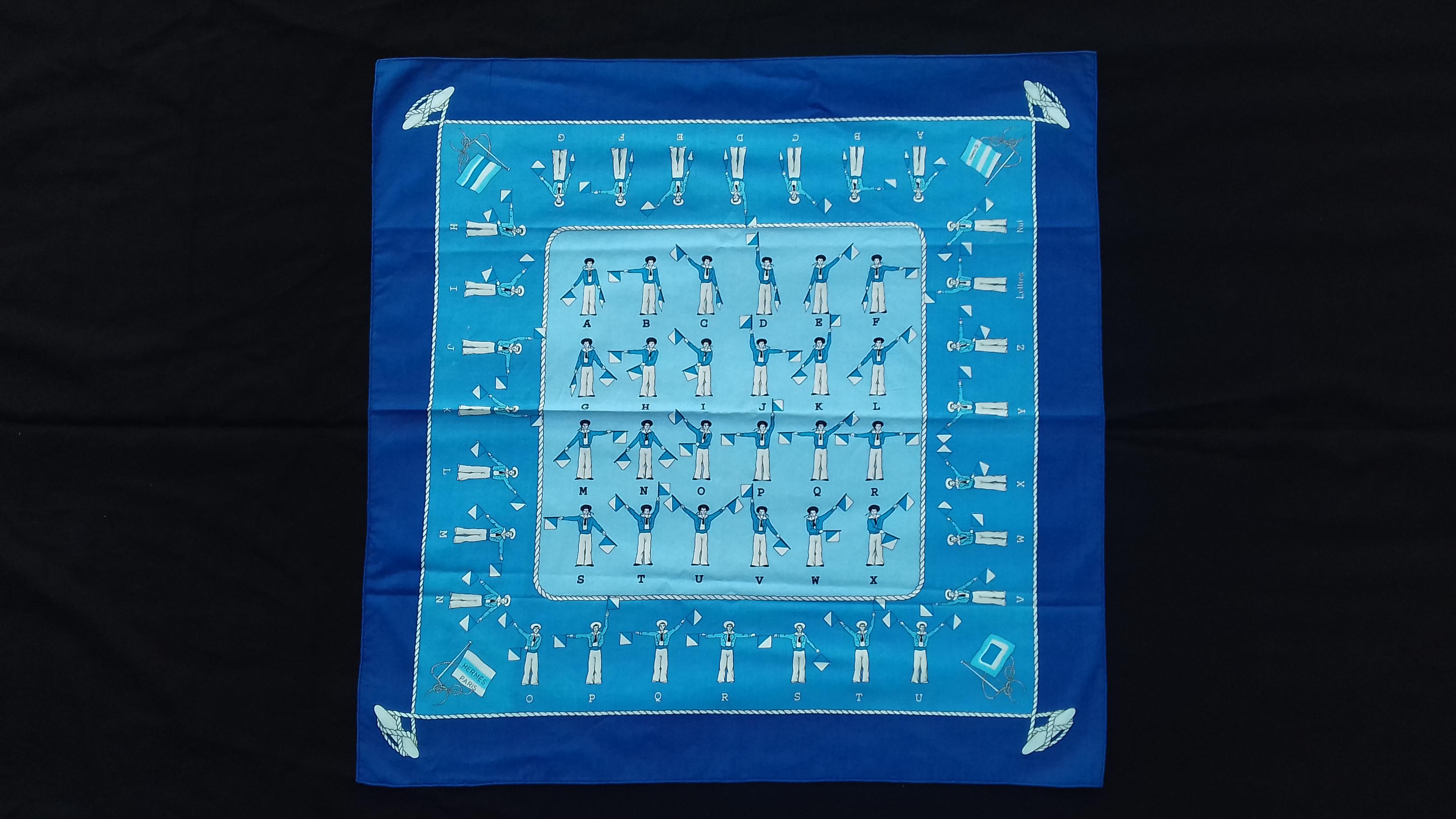 Beautiful Authentic Hermès Scarf

Pattern: Flag Semaphore (