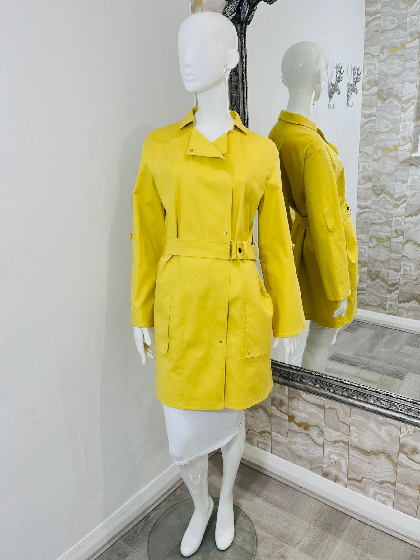 Hermes Cotton Trench Coat

Yellow coat embellished with a d-ring belted waist. Features oversized front pockets and side snap closure. Classic collar and mid thigh length.

Additional information:
Size- 42FR
Composition- 97% Cotton, 3%