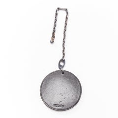 HERMES Cow Charm black leather coin ruthenium bag charm