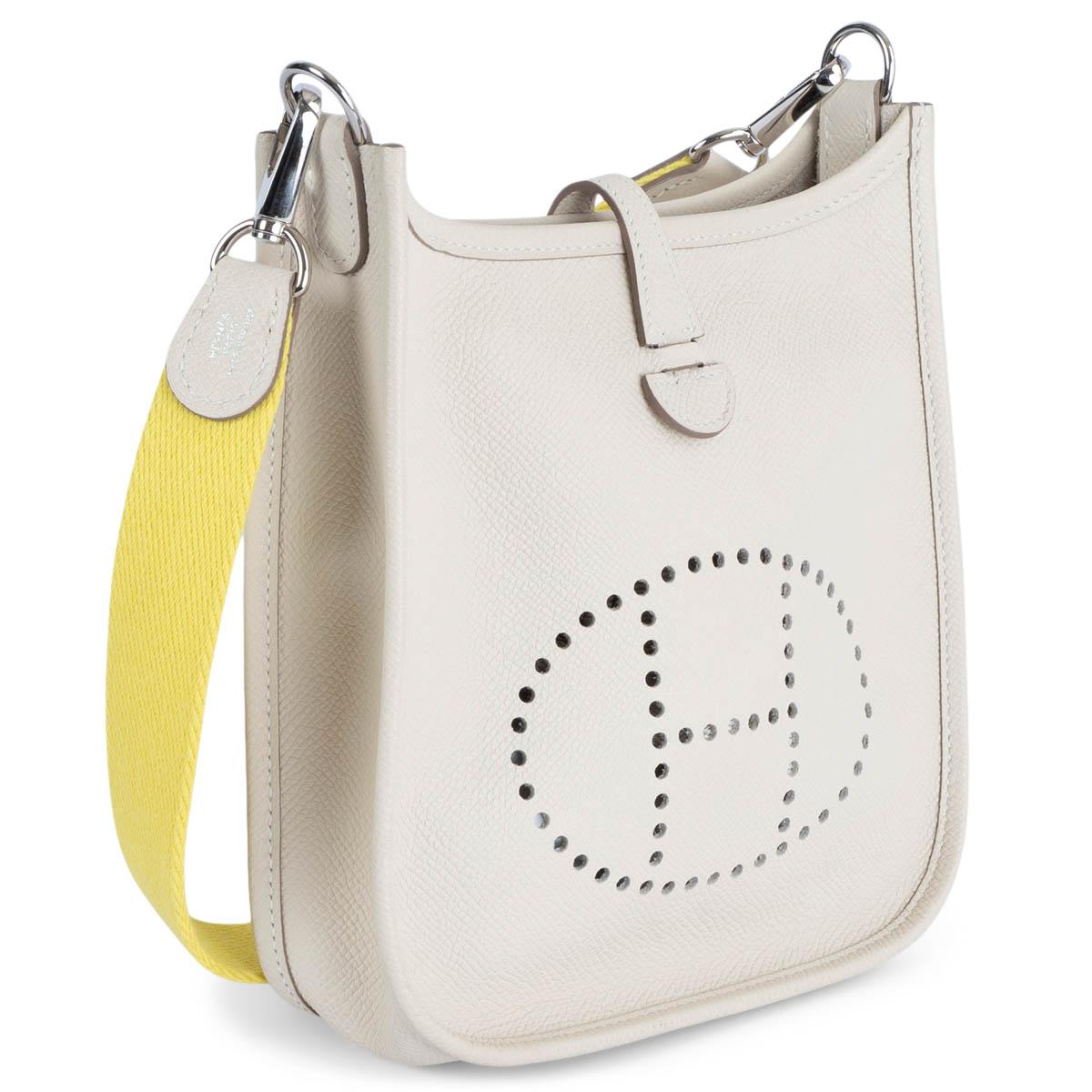 100% authentic Hermès Evelyne 16 TPM Crossbody Bag in Craie (ivory) Veau Epsom leather with lime wool sanglestrap, perforated leather 