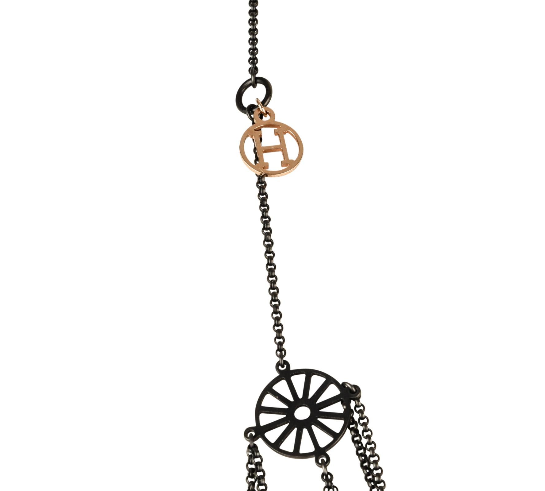 Mightychic offers a limited edition Hermes Crazy Caleche necklace featured Blackened Silver and 18K Rose Gold.
Finely crafted deconstructed carriage charms.
T shaped clasp.
Beautiful and unmistakably Hermes.
Comes with gift box and signature Hermes