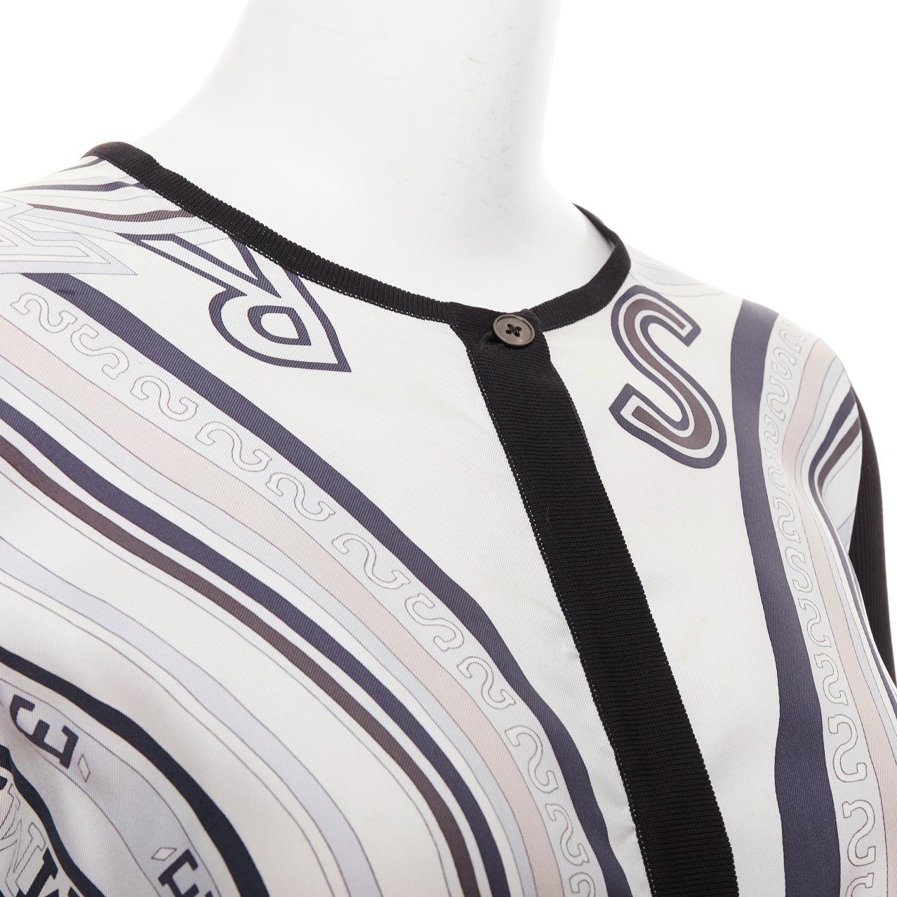 HERMES Creme schwarz 100% Seide Schal Panel Baumwolle gerippt Strickjacke S
Referenz: LNKO/A02605
Marke: Hermes
MATERIAL: Seide, Baumwolle
Farbe: Creme, Schwarz
Muster: Geometrisch
Verschluss: Knopf
Zusätzliche Details: Verdeckte