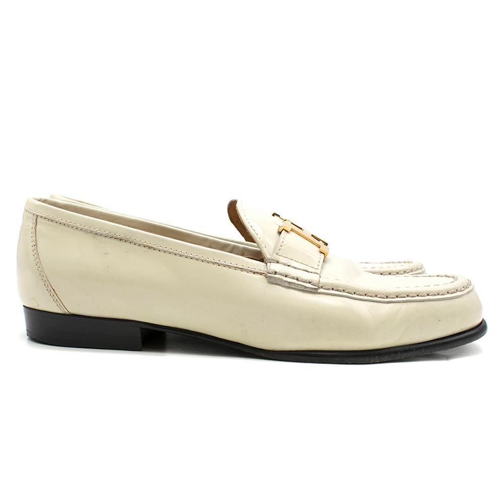 Hermes Cream Polished Leather Loafers

-Gold plated Classic H buckle
-Black Leather Sole
-Tan insoles
-Stitching detail

Please note, these items are pre-owned and may show some signs of storage, even when unworn and unused. This is reflected within