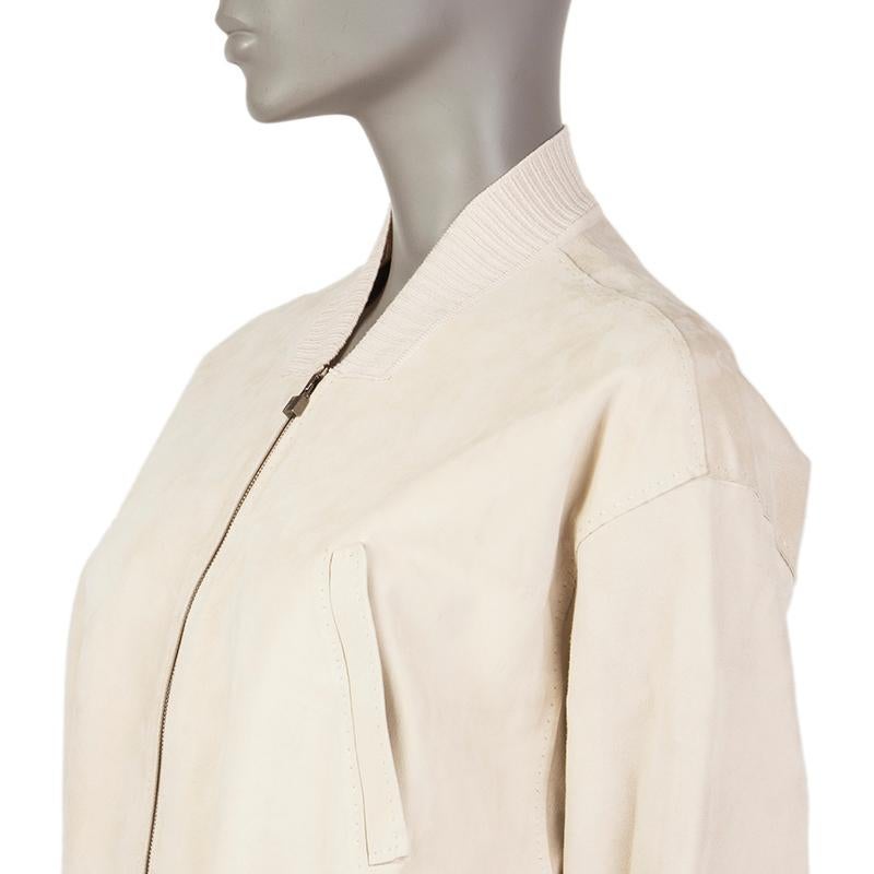 Hermes cropped bomber jacket in off-white lambskin suede and pale rose cotton (100%). With ribbed details and two pockets on the front. Closes with double-sided zipper on the front. Has been worn and is in excellent condition.

Tag Size 42
Size