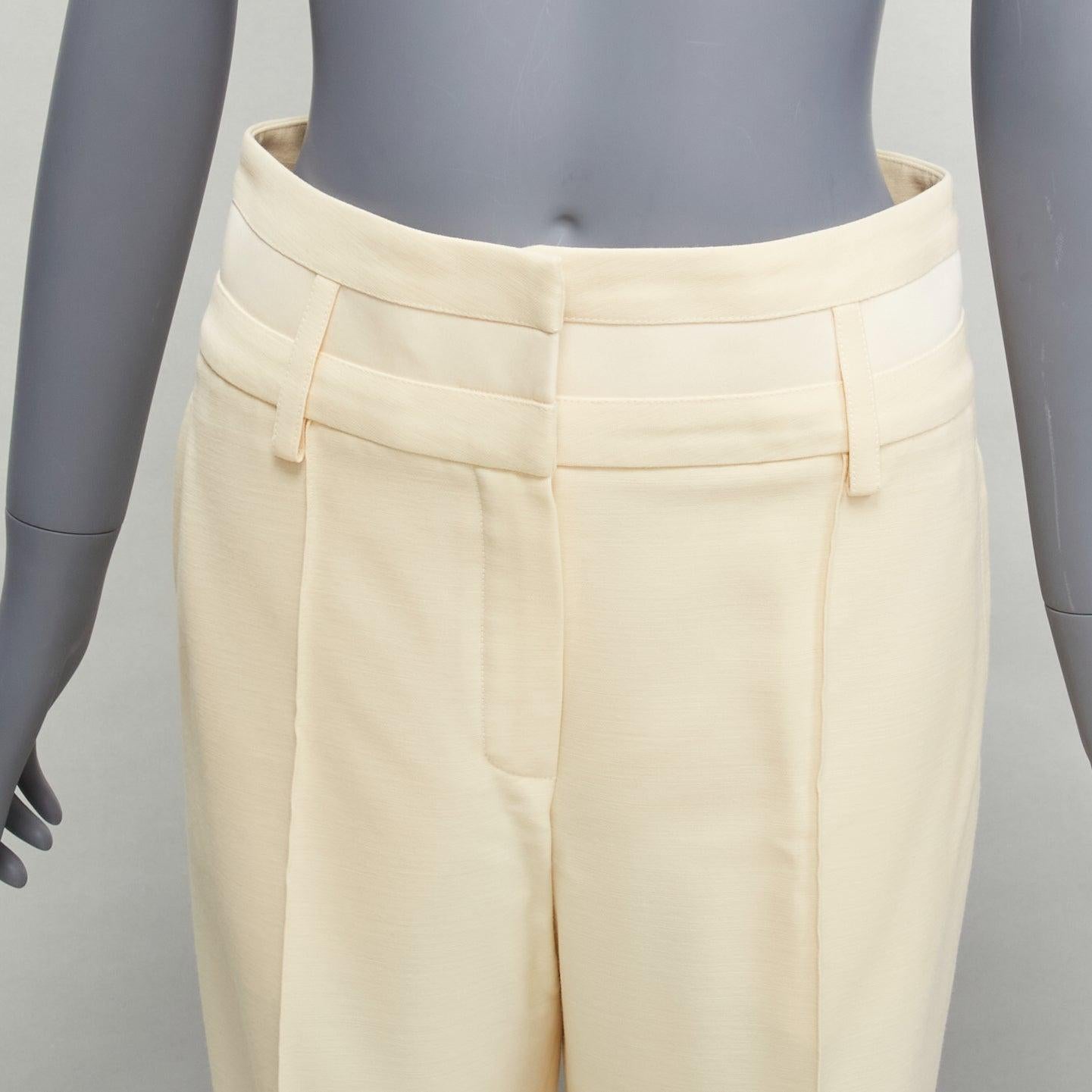 HERMES cream wool silk panelled waistband wide leg cropped pants FR34 XS
Reference: SNKO/A00298
Brand: Hermes
Material: Wool, Silk
Color: Beige
Pattern: Solid
Closure: Zip Fly
Lining: Cream Fabric
Extra Details: Panels at waistband.
Made in: