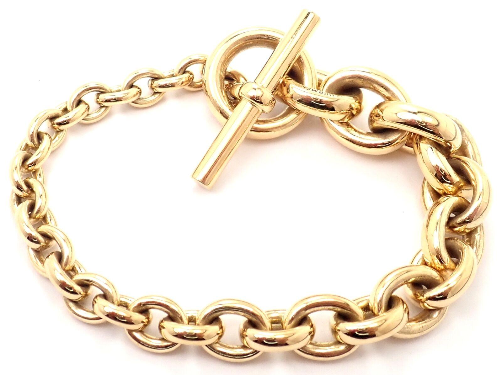 18k Gelbgold schwere Link Toggle Crescendo Armband von Hermes.
Einzelheiten:
Gewicht: 83,6 Gramm
Länge: 8