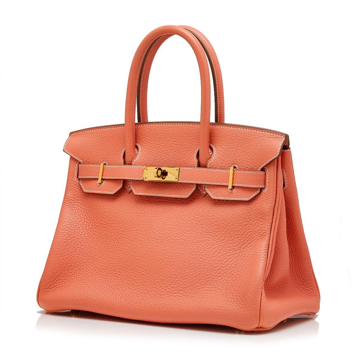 Adding a twist to the traditional Hermès Birkin, this truly spectacular, one-of-a-kind rarity combines a vivid crevette togo leather exterior with gold-tone metal accents, for an effect that is unexpectedly modern and fresh. Crafted in France, this