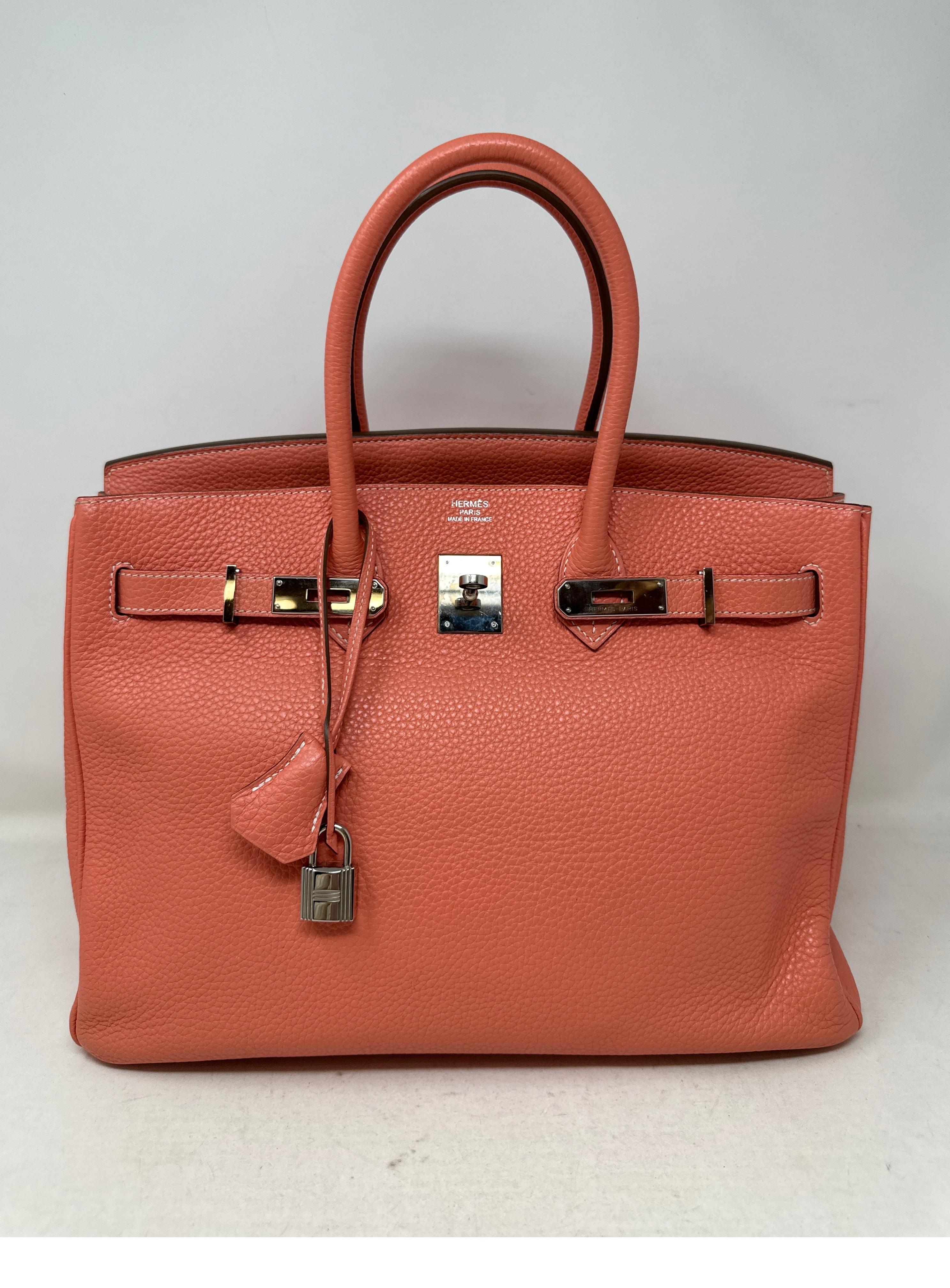 Hermes Crevette Birkin 35 Bag. Salmon pink color. Palladium silver hardware. Pretty pink color. Clemence leather. Interior is clean. Excellent condition. Includes clcohette, lock, keys, and dust bag. Guaranteed authentic. 