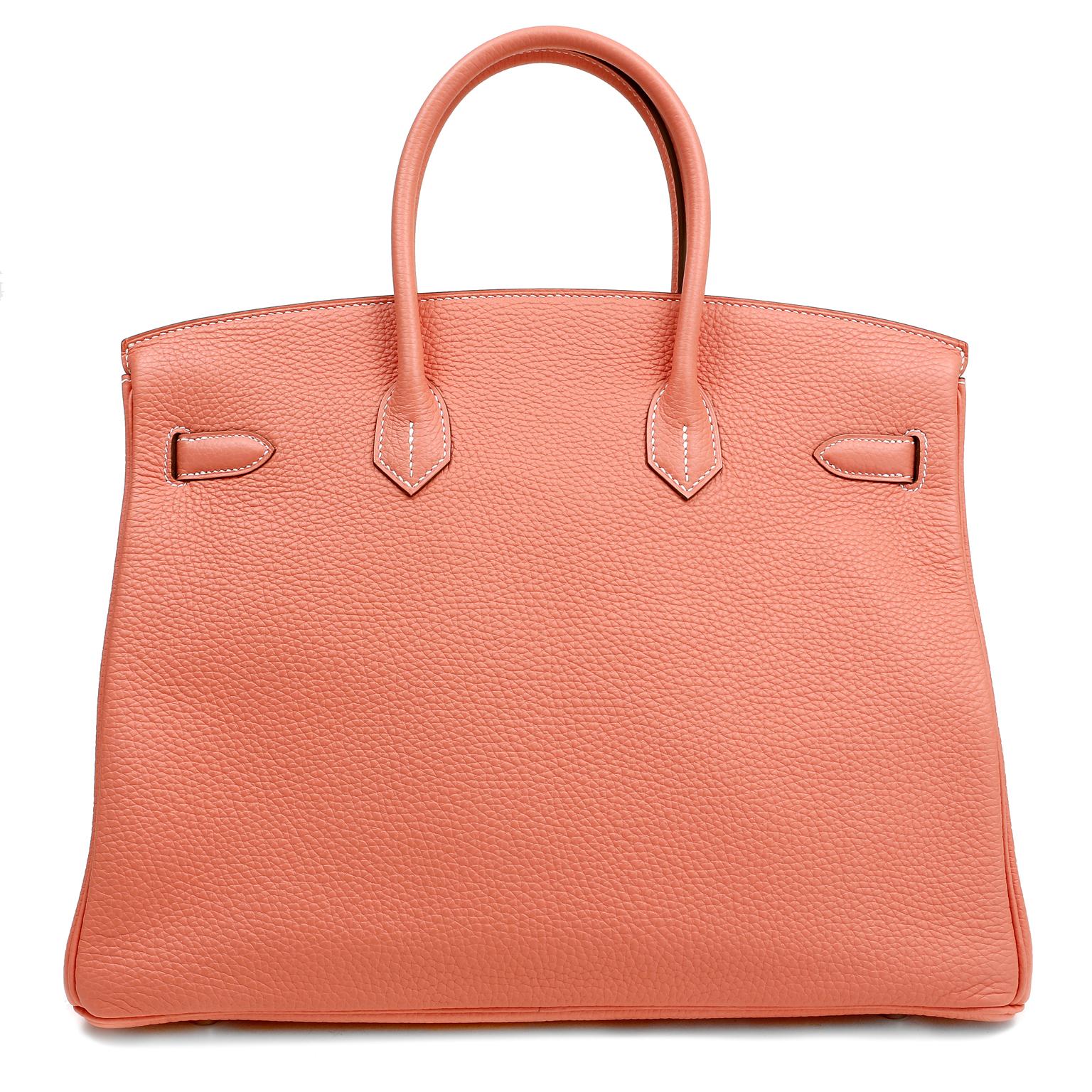 This authentic Hermès Crevette Togo 35 cm Birkin is in pristine unworn condition; the protective plastic is still intact on the hardware.  Hermès bags are considered the ultimate luxury item the world over.  Hand stitched by skilled craftsmen, wait