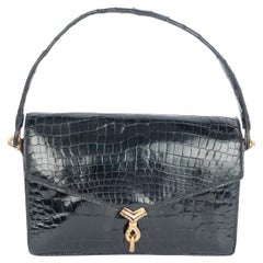 Hermès crocodile bag
Cordeau