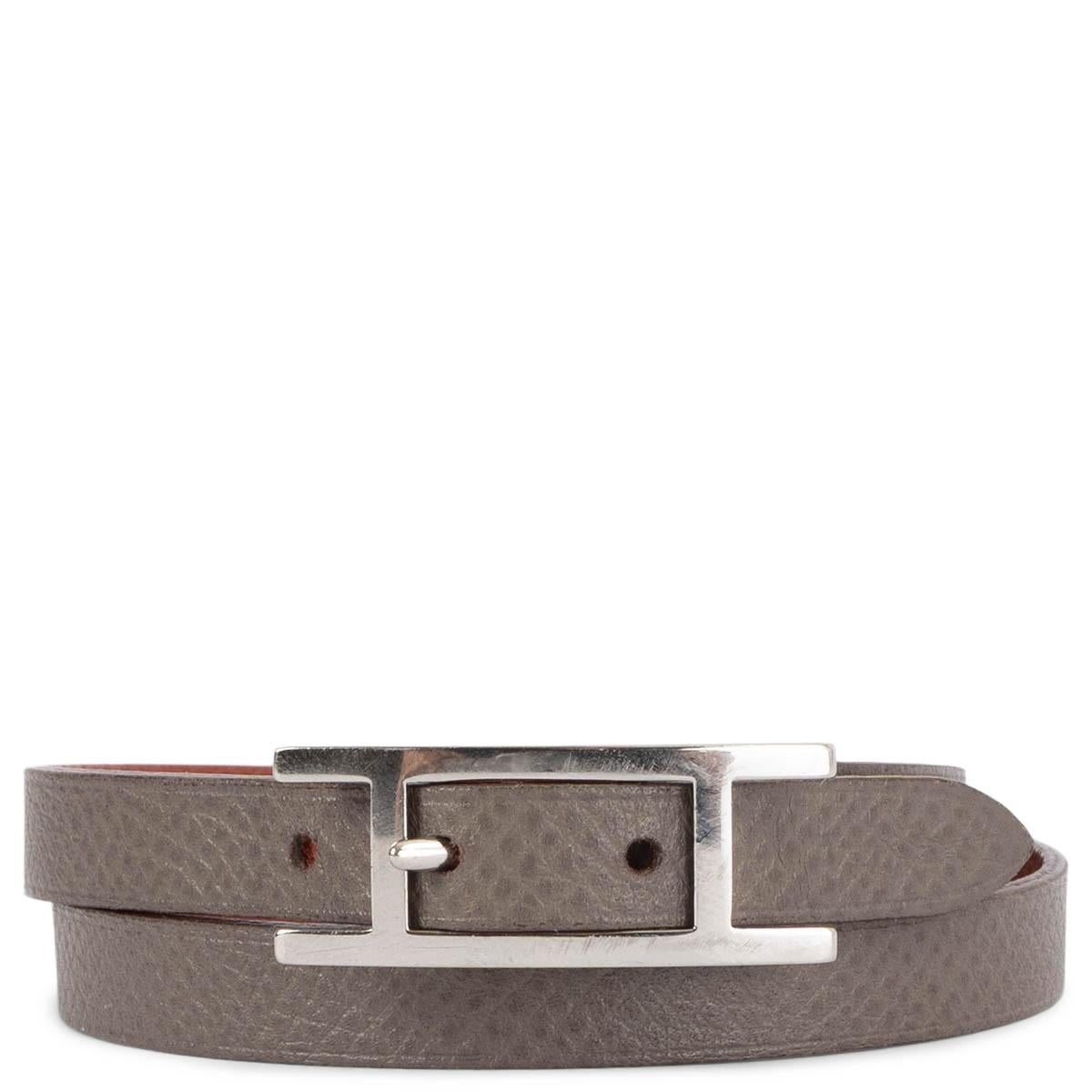 100% authentic Hermès Behapi double wrap reversible bracelet in Cuivre (brick red) and Etain (grey) Epsom leather with Palladium hardware. Has been worn and shows some scratches to the hardware. Overall in very good condition. 

Measurements
Tag
